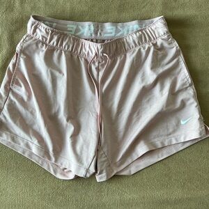PINK NIKE RUNNING SHORTS